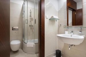 Koupelna v ubytování Brovaria Boutique Hotel Stary Rynek - Old Town Square