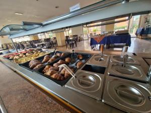 Kuchyň nebo kuchyňský kout v ubytování Hotel Rivadoro-Spiaggia ombrellone e lettini-Piscina-Parcheggio