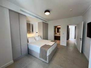 Postel nebo postele na pokoji v ubytování Dopios Studios Nafplio