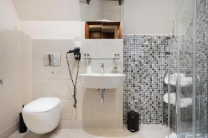 Koupelna v ubytování Brovaria Boutique Hotel Stary Rynek - Old Town Square