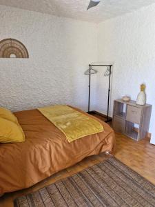 Postel nebo postele na pokoji v ubytování Cocody