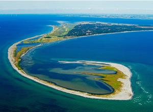 an aerial view of an island in the ocean at Villa Olympia in Skanör med Falsterbo