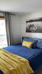 Ένα ή περισσότερα κρεβάτια σε δωμάτιο στο Cozy Timbers