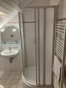 Koupelna v ubytování Hotel a vinařství Sádek