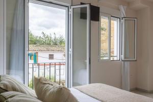 Postel nebo postele na pokoji v ubytování Casa 3 plantas con patio y Solárium privados