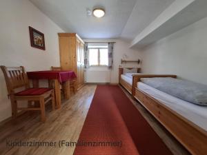 Postel nebo postele na pokoji v ubytování Gästehaus Meisl
