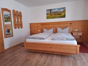 Postel nebo postele na pokoji v ubytování Gästehaus Meisl