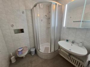 Koupelna v ubytování Gästehaus Meisl + 16 fotografií