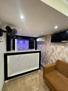 TV a/nebo společenská místnost v ubytování Hotel Cliff Garden + 28 fotografií