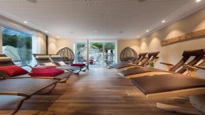 a row of chairs in a waiting room at Bayern Resort Apartments in Grainau