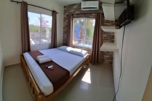 TV a/nebo společenská místnost v ubytování Hotel Playarena