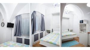 Un pat sau paturi într-o cameră la Nicolae Balcescu Apartment
