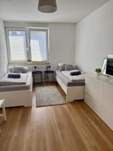 Ένα ή περισσότερα κρεβάτια σε δωμάτιο στο Spacious 3-Bed Apartment WiFi, Netflix, Self Check-in