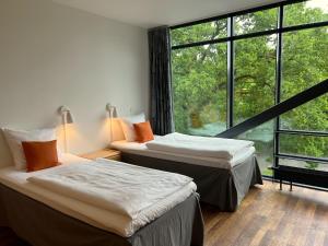 Postel nebo postele na pokoji v ubytování Vingsted Hotel & Konferencecenter
