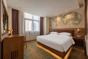 Katil atau katil-katil dalam bilik di Xiangshan Xishe Hotel People's Square Branch