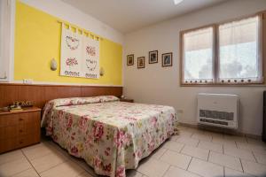 Ένα ή περισσότερα κρεβάτια σε δωμάτιο στο Agriturismo Poggio degli Ulivi +54 φωτογραφίες