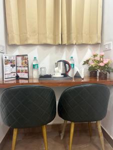 Η κουζίνα ή μικρή κουζίνα στο Hotel Breezy Heights