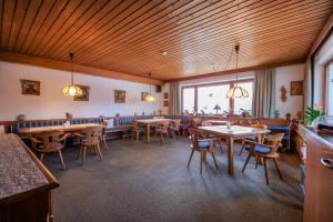 Reštaurácia alebo iné gastronomické zariadenie v ubytovaní Pension Danler