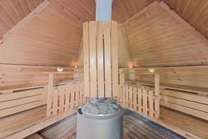 a inside of a sauna with a trash can at Trysil Hyttegrend in Trysil