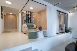 Posezení v ubytování TATRYSTAY Lebenski Premium Apartments + 18 fotografií