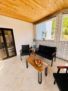 Χώρος καθιστικού στο Harmony Home