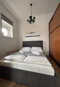 Postel nebo postele na pokoji v ubytování Art-déco