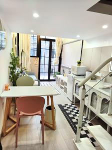 Area soggiorno di 柃居 B&B - Huaihai Middle Road Branch