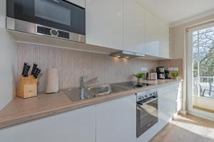 Kuchyň nebo kuchyňský kout v ubytování Haus Strandoase 24