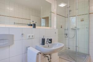 Koupelna v ubytování Haus Strandoase 24 + 10 fotografií