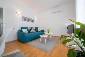 Μια τηλεόραση ή/και κέντρο ψυχαγωγίας στο Apartment Lana