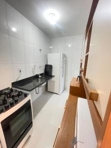 Kuchyň nebo kuchyňský kout v ubytování Casa Ampla e Climatizada - Smart TV e Pet Friendly + 7 fotografií