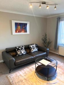 Posezení v ubytování Kelpies Serviced Apartments Hamilton- 2 Bedrooms