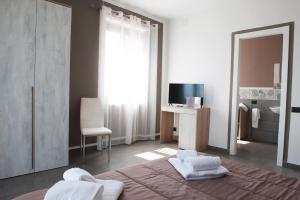 Postel nebo postele na pokoji v ubytování Hotel Riesco