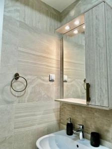 Et badeværelse på Stan na dan BANJALUKA + 6 billeder