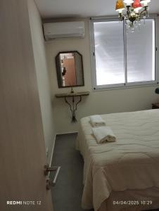 Postel nebo postele na pokoji v ubytování Aparment San Lorenzo 1656