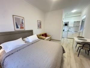 Posteľ alebo postele v izbe v ubytovaní Apartments Charming