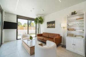 TV a/nebo společenská místnost v ubytování Nos Aqua Villas Chania + 97 fotografií