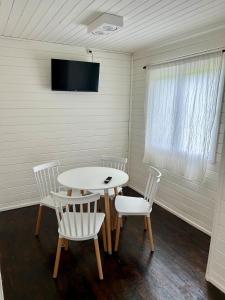 TV a/nebo společenská místnost v ubytování Las Luciérnagas del Delta 1 + 12 fotografií