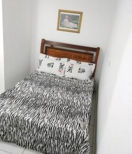 Postel nebo postele na pokoji v ubytování Teresopolis Apartamento Proximo a Feirinha