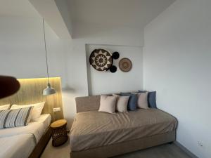 Ένα ή περισσότερα κρεβάτια σε δωμάτιο στο Anfi Suites