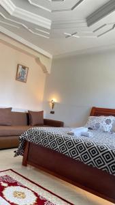 Llit o llits en una habitació de Hotel Ryad Tetouan Aero