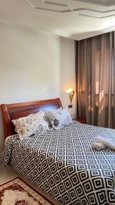 Llit o llits en una habitació de Hotel Ryad Tetouan Aero