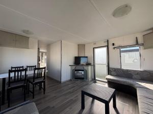 Kuchyň nebo kuchyňský kout v ubytování Mobile home au camping New Vennepark