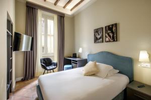 TV a/nebo společenská místnost v ubytování BeSecret Belsiana + 29 fotografií