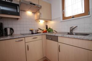 A kitchen or kitchenette at Apart Bergkristall