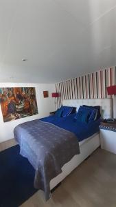 Ένα ή περισσότερα κρεβάτια σε δωμάτιο στο kitty"s Chalet Modern en toch knus