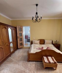 Postel nebo postele na pokoji v ubytování Vila Kost Apartman 2