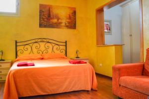 Giường trong phòng chung tại B&B La Corte Lecce