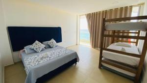 Postel nebo postele na pokoji v ubytování Grand cove hotel + 26 fotografií