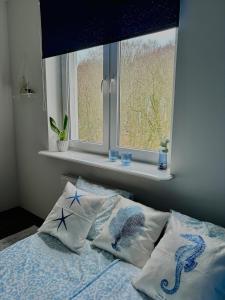 Ένα ή περισσότερα κρεβάτια σε δωμάτιο στο Apartament Spacerowa blisko morza